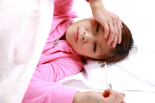 Young japanese woman with fever　 — Stok fotoğraf